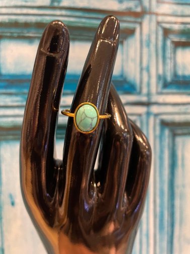 Turkoosi terässormus