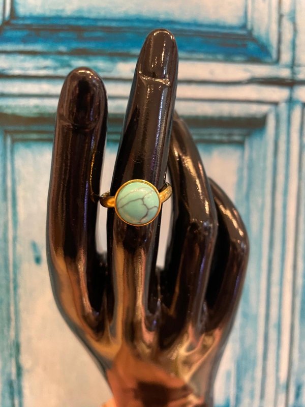 Turkoosi terässormus